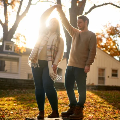 Guy and girl dancing in fall Scotsdale Farm Engagement Photoshoot