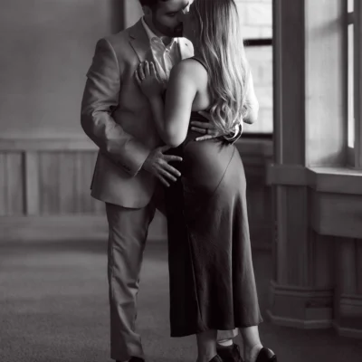 Guy and girl kissing Black Creek Village Engagement Photoshoot