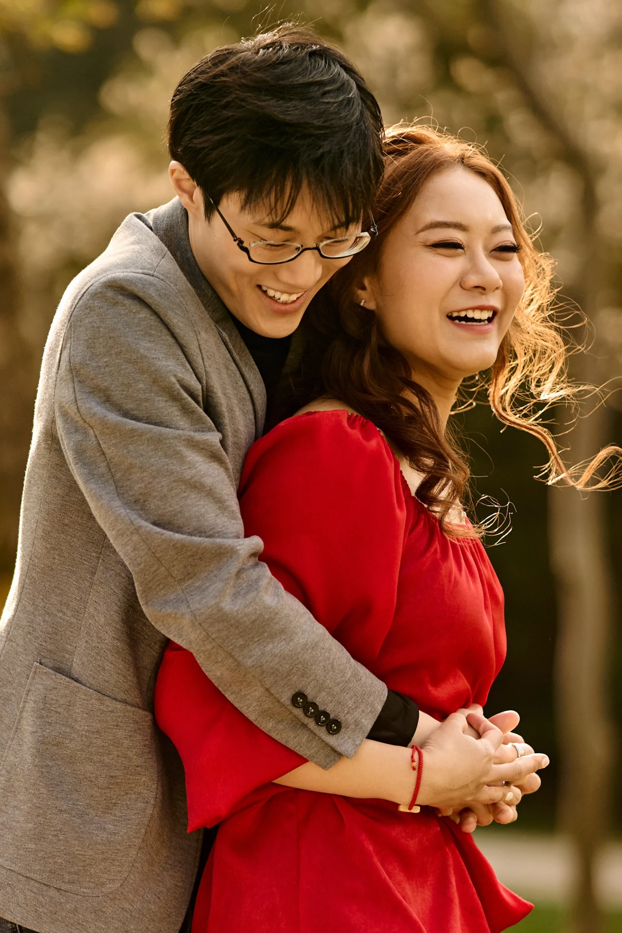 Guy and girl laughing Kariya Park Engagement Photoshoot