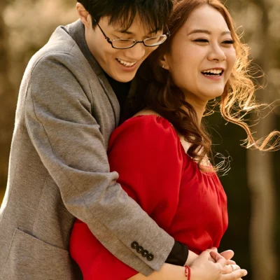 Guy and girl laughing Kariya Park Engagement Photoshoot