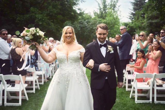 Ceremony coverage of bride and groom at the altar